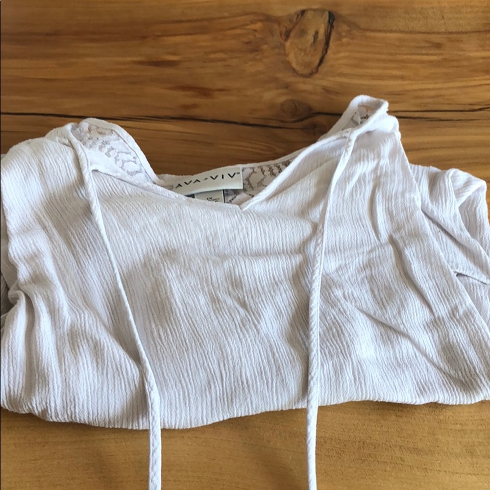 White blouse with a lace back